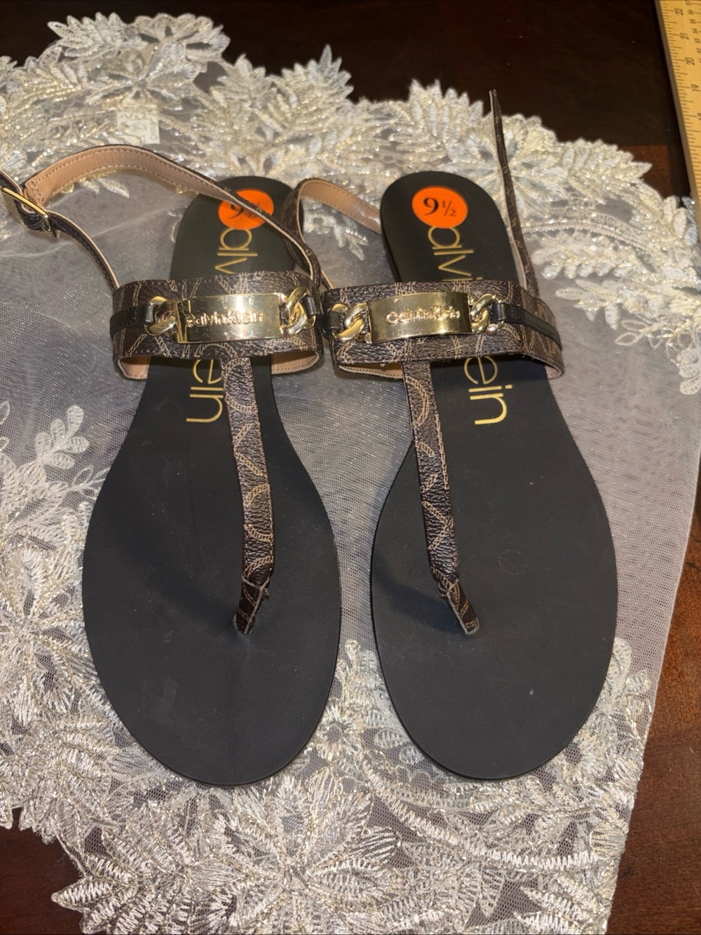 Calvin Klein Brown Monogram T-Strap Sandals with Gold Logo Plaques
